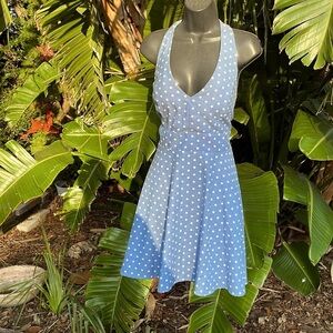 Polkadot denim look fit and flare bow back halter dress